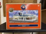 Lionel Scale 6-24113 Hank's Ford Dealership W/lights Figures Brand New In Box. Fixed Price $244.99.