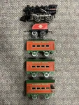 + Hafner Overland Flyer Tin Litho Wind Up Locomotive 3 Car Sunshine Special Set. Fixed Price $295.00.