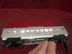 Lionel 2434 Newark Pullman Car Silver, Red Ltrg Postwar Gauge Lights. Fixed Price $33.95.