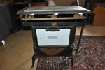 Packer Rapid Fire Antique Gas Stove 3 Burner Cast Iron Porcelain Oven. Fixed Price $995.00.