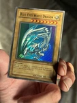 Blue-eyes White Dragon 2002 SDK-001 1ST Edition Foil Line Split Misprint Error. Fixed Price $2500.00.