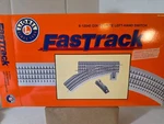 Lionel 6-12045 O36 Remote Left-hand Switch Fastrack Complete W/ Instructions. Fixed Price $85.00.