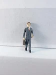 Arttista #1498 - Man Suit Walking/stepping Down Scale Figure New. Fixed Price $10.50.