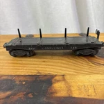 Lionel 1950S Postwar Gauge Log Dump Car #3451 With (4) Stakes Untested As Is. Fixed Price $15.64.