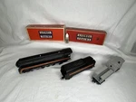 Lionel Postwar 746 Norfolk And Western Loco, Tender 6419-100 Work Caboose. Fixed Price $850.00.