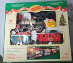 Vtg 1997 Christmas Santaland Musical Animated Train Set Scale, New Bright. Fixed Price $37.95.