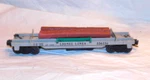 Lionel Gauge #3361-55 Dump Car W/3 Plastic Logs. Fixed Price $6.99.