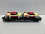 Lionel 6-17536 Gauge Route 66 Flatcar W/ 2 Red And Cream Luxury Coupes. Fixed Price $20.00.