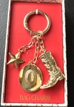New Bag Charm Gold Metal Cowgirl Boot Hat Star Keychain Purse. Fixed Price $16.85.