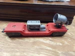 Marx Gauge Wecx Flatcar With Searchlight And Generator No. 4571. Fixed Price $12.00.