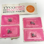 Tyco Pro Ho Scale Racing Service Part 8877:30 Front Hubs And Tires 4 Sets Sheet. Fixed Price $59.09.