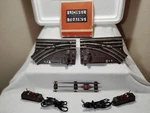 O-27 Gauge Lionel Switch Pair (no 5121 & 5122) With Controllers +uncoupler 65149. Fixed Price $25.00.