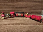 Mickey Mouse Holiday Express Train Set 4 Pieces. Fixed Price $25.00.