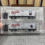 Scale Micro Trains Line - Pepsi Cola 2 Pack 36' Wood Sheathed Ice Reefers. Fixed Price $29.99.