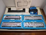 1970S Life Like Amtrak Rare Aluminum Elec. Ho Train 4 Set Cars Circle Tracks. Fixed Price $194.90.