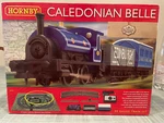 Hornby R1151 Oo Gauge Caledonian Belle Complete Train Set Never Used. Fixed Price $138.00.