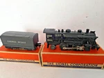 Post War Lionel #1001 Gauge 2-4-2 Steam Locomotive With Scout Tender And Boxes. Fixed Price $49.99.