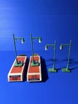 Lionel Postwar #64 Highway Lamp W/boxes (X4). Fixed Price $100.00.