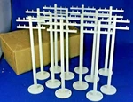 Plasticville O-O27 #TP-5 White Telephone Poles (12) Dealer Box Excellent. Fixed Price $145.00.