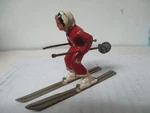 Vintage Barclay Cast Metal Christmas Lady On Skis Figure - Red. Fixed Price $24.00.