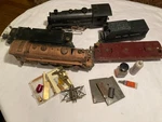 Group Of C1940-50S Lionel Train Engine 1666 And Other Parts Lot Sold As Pictured. Fixed Price $35.00.