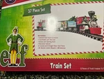 New Lionel Battery Elf Movie Toy Train Set Locomotive Cars, Remote, Sound, Light. Fixed Price $125.00.