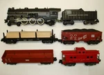 Set W/ 293 American Flyer Pacific Locomotive + Freight Cars Lot 9-S124. Fixed Price $129.99.