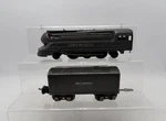 Lionel 1668E Vintage 2-6-2 Gunmetal Streamline Steam Locomotive & Tender. Fixed Price $76.49.