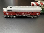 Life-like Ho-scale Holiday Rails Train Set, Locomotive And Cars. Fixed Price $60.00.