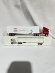 The Ertl Company Red Cabover Semi With Van Trailer By 1/64TH Scale. Fixed Price $20.00.