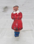 Vintage Barclay Lead Woman Sitting (on Bench) Figure From Ice Skating Set. Fixed Price $7.99.