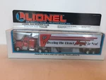 Lionel 6-12875, Railroader Club Tractor And Trailer, Nib (1994). Fixed Price $28.00.