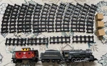 Lionel Pennsylvania Flyer 561 Scale Battery Engine Tender Caboose 16 Track Pcs. Fixed Price $75.00.
