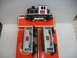 Lionel 6-11912 " Steel Diesel & Two Cast Ore Cars Lot #46743. Fixed Price $175.00.