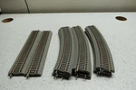 Mix Lot Of 16 9" Atlas 450 STRAIGHT-460 Ho Rail Used 12 Curved. Fixed Price $16.00.