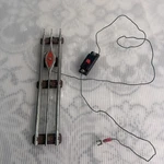 Lionel 027 Remote Control Uncoupling Track Section W/ Brown Ties & Button #9. Fixed Price $13.49.