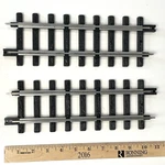 2 Straight Replacement Christmas Train Track By New Bright Black & Metal. Fixed Price $19.75.