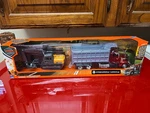New Ray 1:43 International Lonestar Dump Truck With Excavator 16623. Fixed Price $32.95.