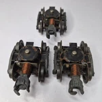 Lionel Post War Gauge Staple End Trucks With Slide Shoes Copper Lot Of 3. Fixed Price $17.99.