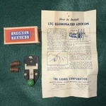 Lionel Postwar Ltc Lockon W/ Light Instructions 2 Coiled Wires Ob. Fixed Price $26.00.