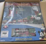 Lionel 6-82716 Disney Mickey's Holiday To Remember Christmas Lionchief Train. Fixed Price $420.00.