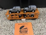 Mth Rail King Auto Carrier W/ Erti '32 Panel Vans Item No. 30-7667. Fixed Price $50.00.