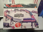 Lionel Graduated Trestle Set And O27 Gauge 6-12754 22 Piers Tie Channels. Fixed Price $50.00.