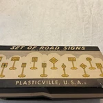 Plasticville Complete Set Of Road Signs With Original Box And Insert. Fixed Price $10.18.