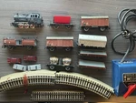 Marklin Ho Train Set With 0-6-0 Locomotive 8 Cars, Track & Controller. Fixed Price $134.95.