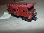 Marx 17858 Rock Island Bay Window Caboose With Stack Railing M55. Fixed Price $115.00.