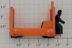 Lionel 356-35 Orange Baggage Cart Truck And Figure. Fixed Price $8.00.