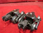Lionel Postwar Pair Staple End Trucks With Roller Pick Up. Fixed Price $9.95.