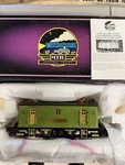 Mth Standard Gauge Tinplate Two Tone Green No. 9E Electric Locomotive With Box. Fixed Price $499.00.