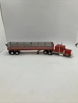 Lionel Red Silver Metal Semi Truck Trailer 12" Scale Front Wheel Missing. Fixed Price $15.00.